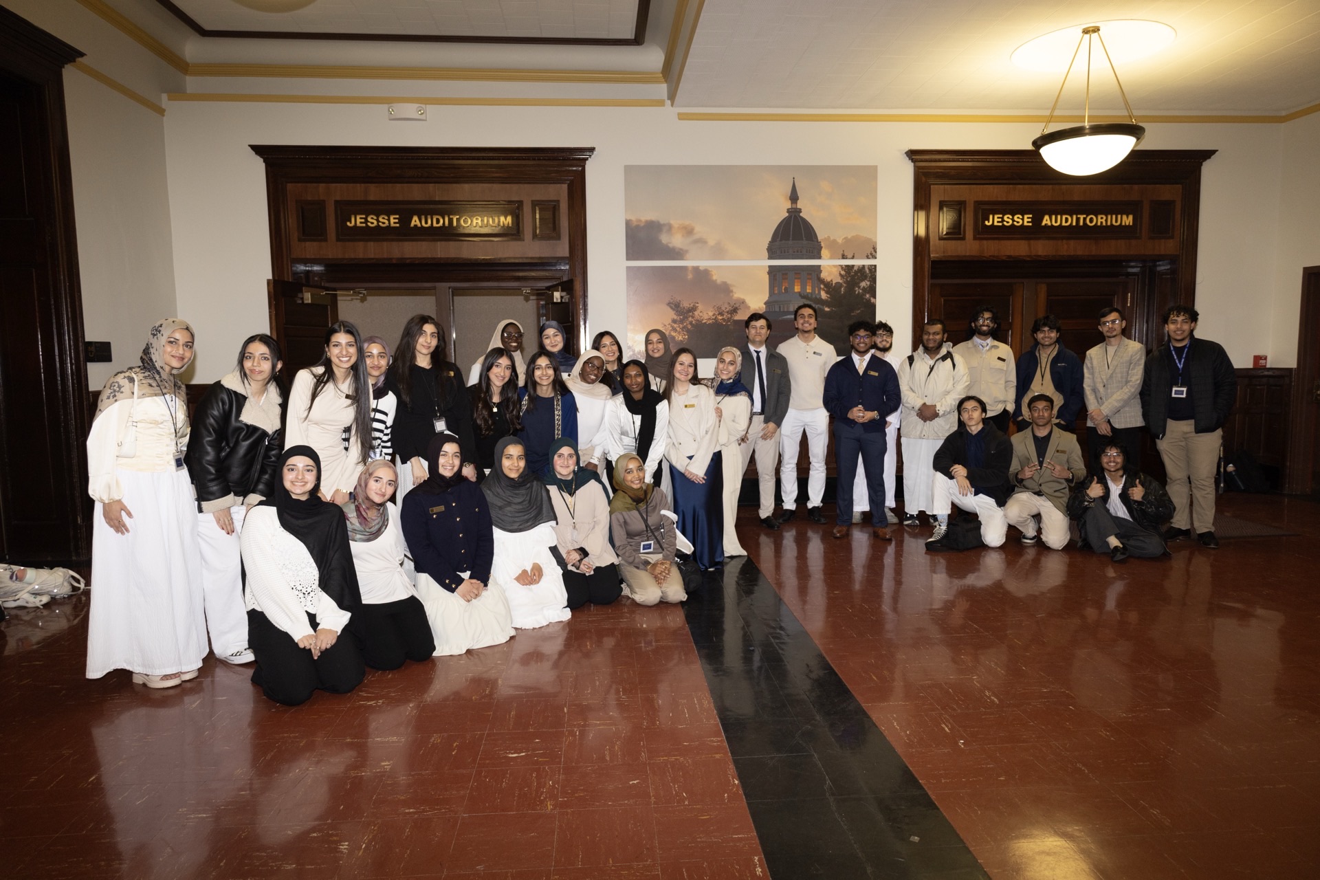 Najm community group photo at Jesse Auditorium
